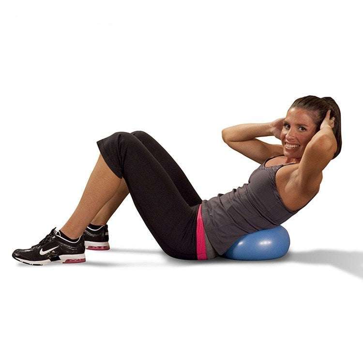 Woman exercising with a mini yoga ball