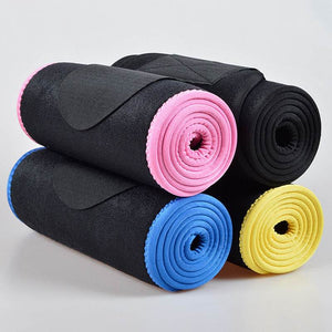 Active Waist Trimmer fitness belts in black, pink, blue, and yellow colors, rolled and ready for workout use.