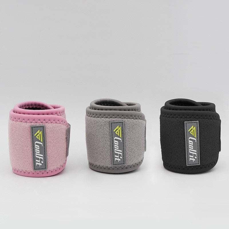 Active wrist support in pink, grey, and black with non-slip design.