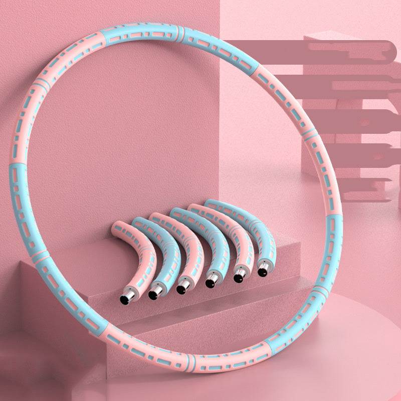 Classic Exercise Hoop with steel core and foam grip, adjustable 94cm diameter, pictured with detachable sections on pink backdrop.