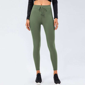 Olive green comfy leggings with adjustable waistband and pocket, perfect for workouts and casual wear.