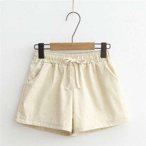 Comfy shorts with adjustable drawstring waist and convenient pockets, made from soft cotton fabric for everyday wear.