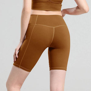 Comfy Yoga Shorts in brown, designed for comfort and flexibility, perfect for workouts or casual wear.