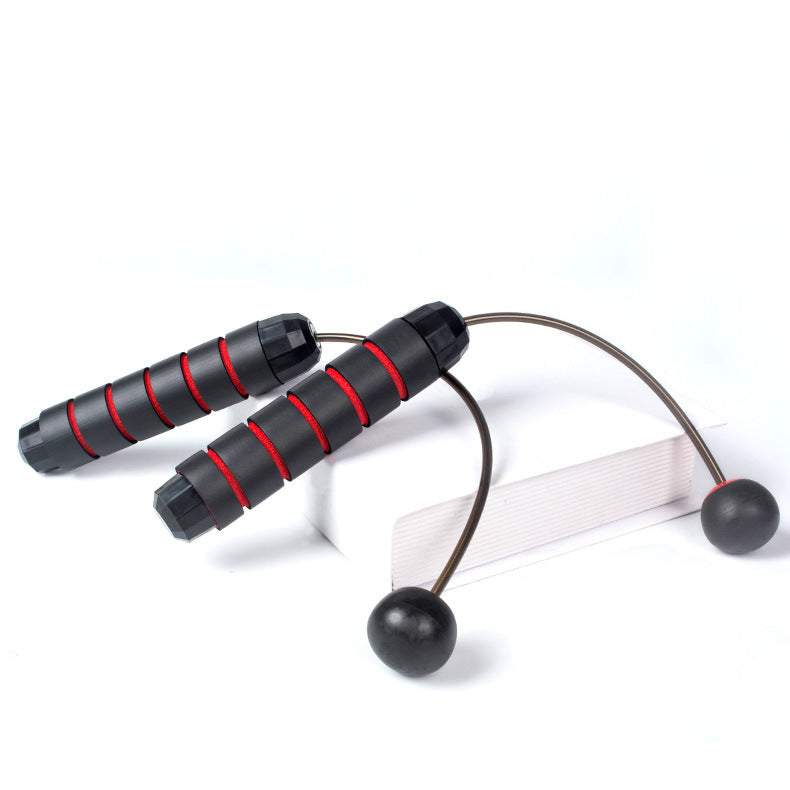 Cordless jump rope with ergonomic handles and weighted balls for indoor and outdoor workouts.