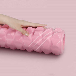 Enhanced Fitness Roller in pink with grip points for deep tissue massage and muscle recovery.