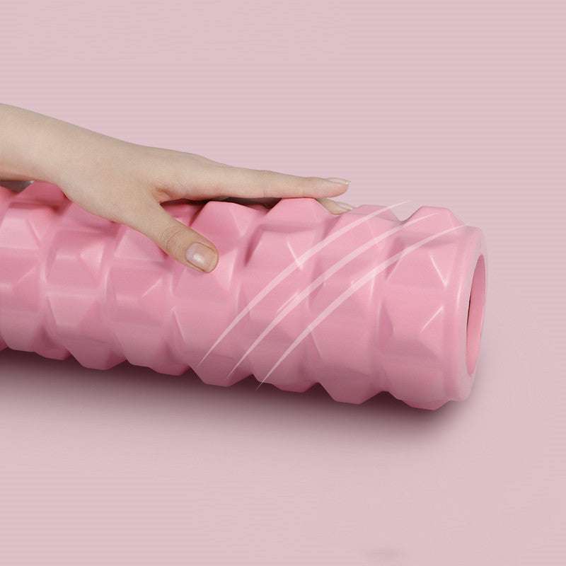 Enhanced Fitness Roller in pink with grip points for deep tissue massage and muscle recovery.