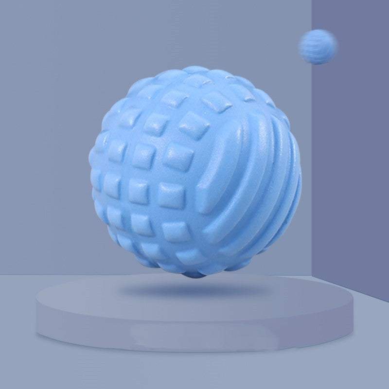 Blue textured Enhanced Massage Ball for muscle relief and relaxation on a display stand.