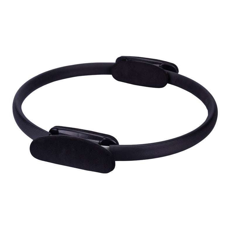 Black exercise ring with stable grip handles, ideal for yoga and pilates workouts.