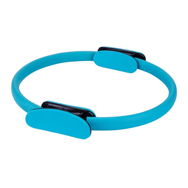 Blue exercise ring with grip handles for yoga and pilates workouts.