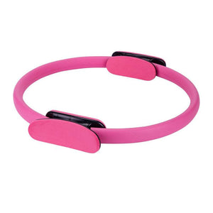 Pink exercise ring with stable grip handles for yoga and pilates workouts.