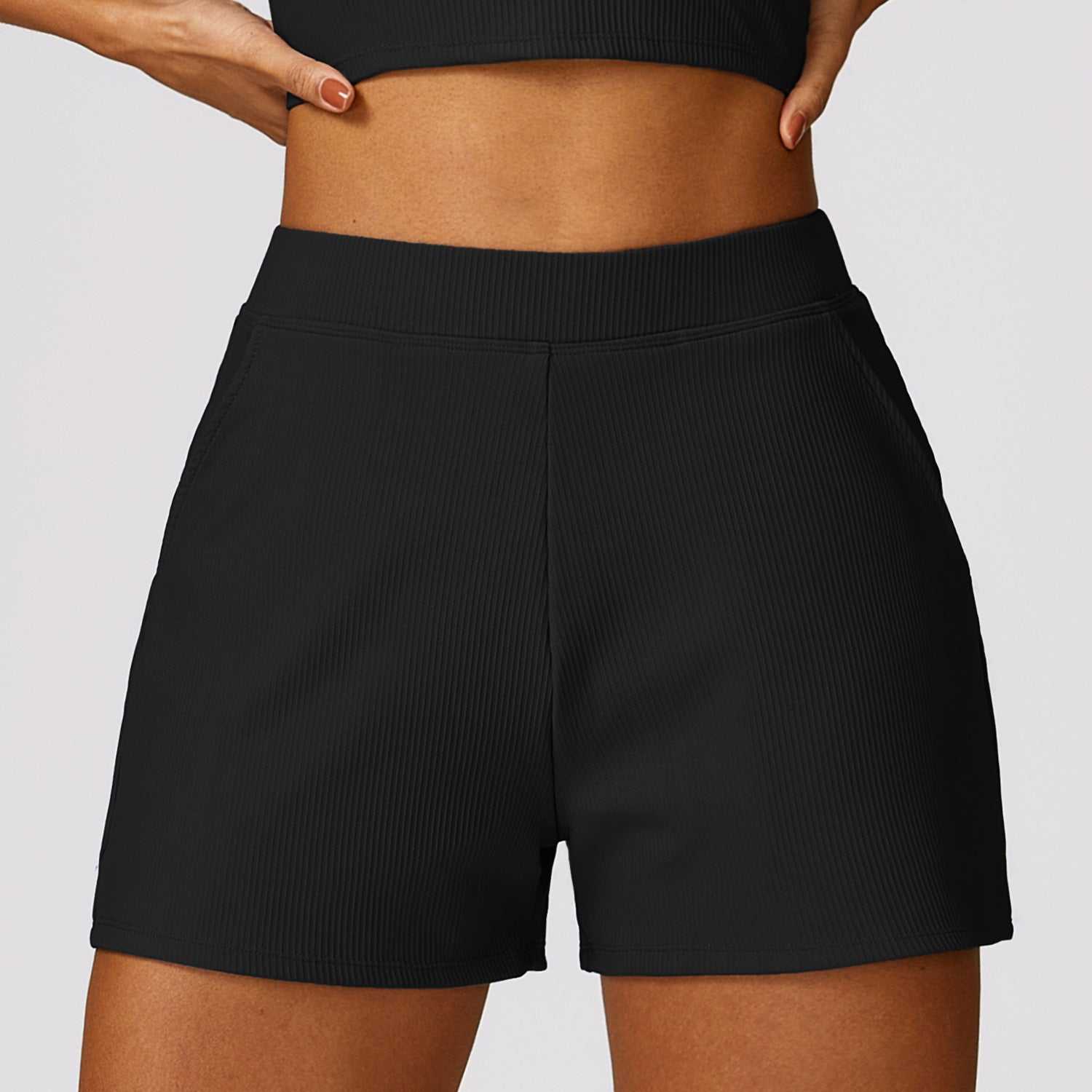 High waist black shorts with a comfortable fit and breathable nylon fabric.