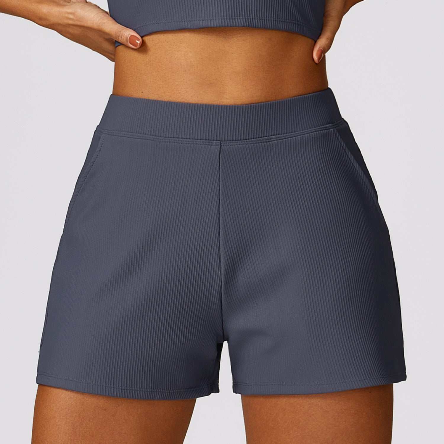 High waist shorts in dark color, breathable nylon fabric, quick-drying, practical pockets.