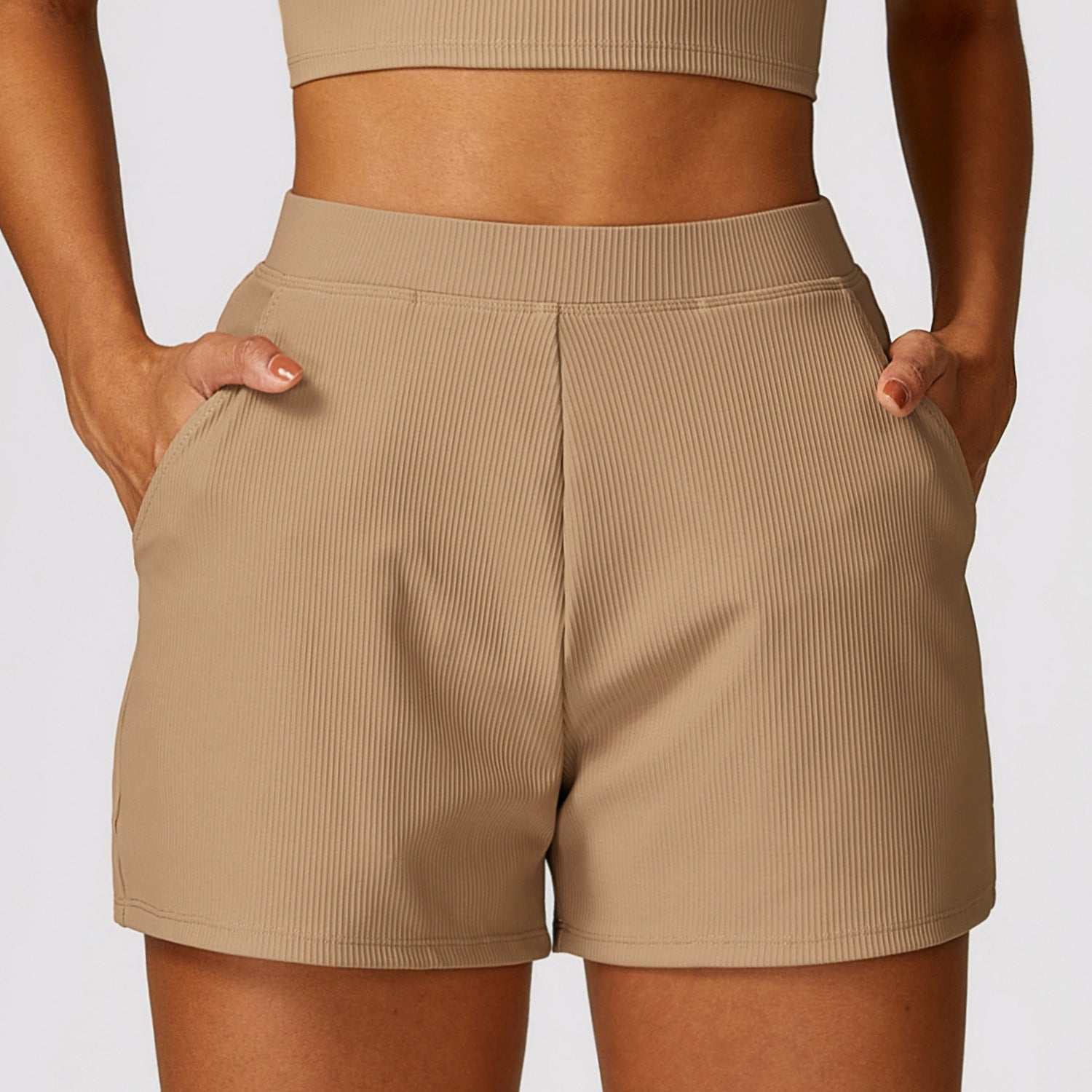 High Waist Shorts in nylon fabric with convenient pockets and stylish high-waist design.