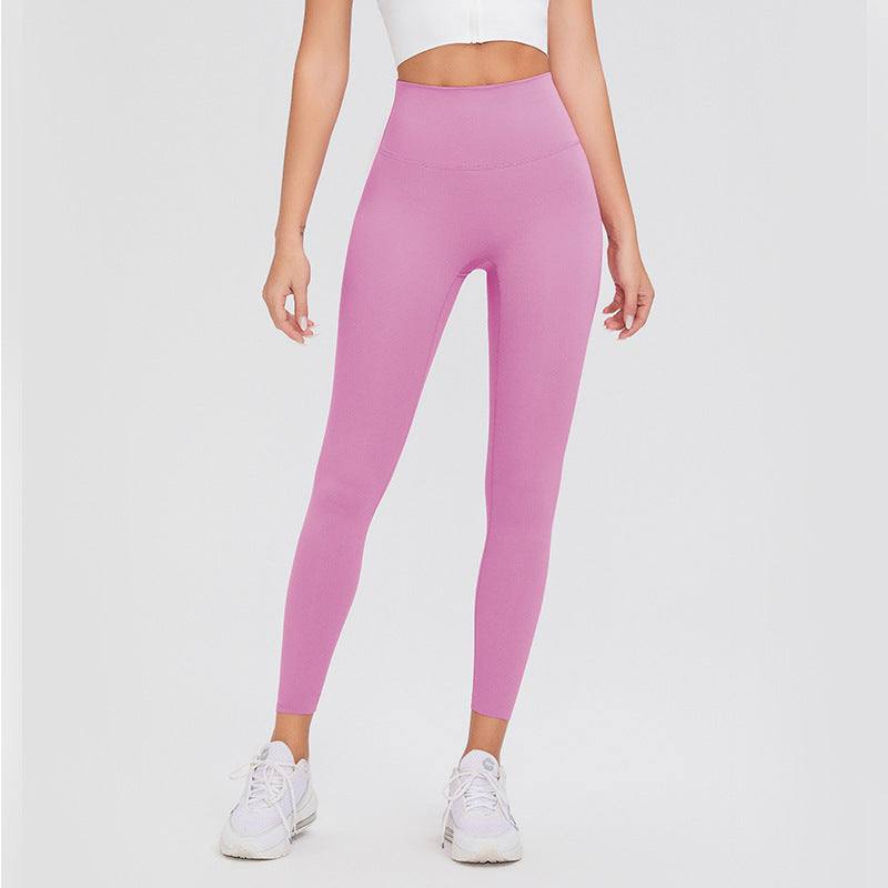 Pink high waist leggings providing style and functionality for workouts and lounge wear.