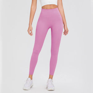 Pink high waist leggings providing style and functionality for workouts and lounge wear.