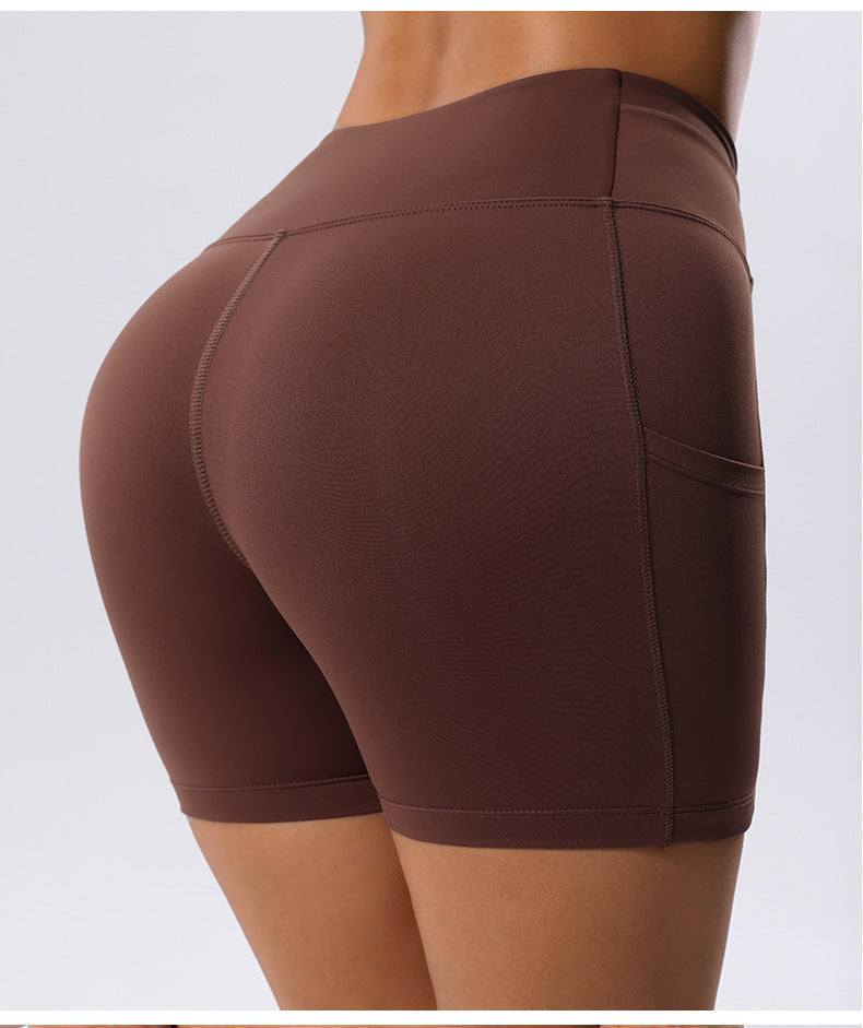 High Waist Yoga Shorts in brown, featuring a high-waist design and pocket detail.