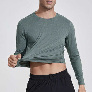 Long sleeve shirt in green, showcasing breathable and quick-drying fabric for comfort and performance.