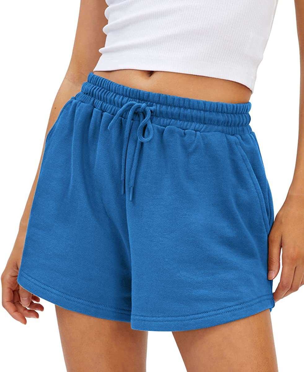 Blue loose fit shorts with a drawstring waist, made of quick-drying, breathable polyester fabric for comfort and style.