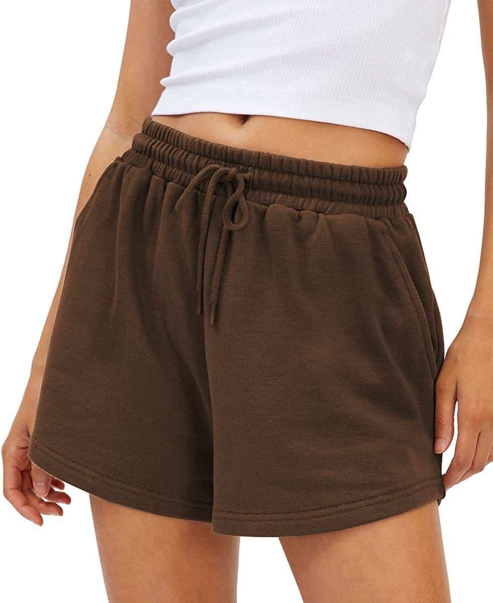 Brown loose fit shorts with elastic waistband and drawstring, quick-drying breathable fabric, perfect for active lifestyle.