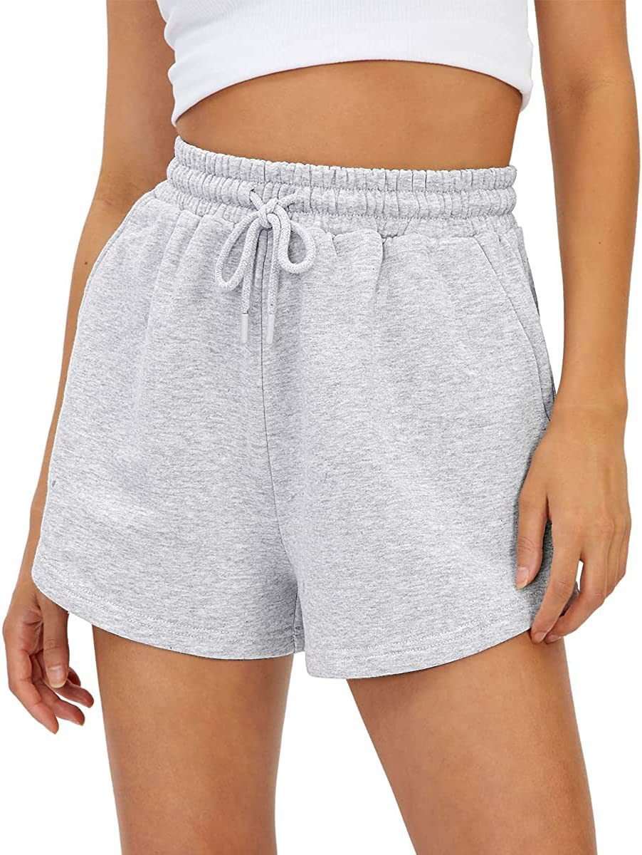 Loose fit shorts with adjustable drawstring and pockets, shown in light gray.