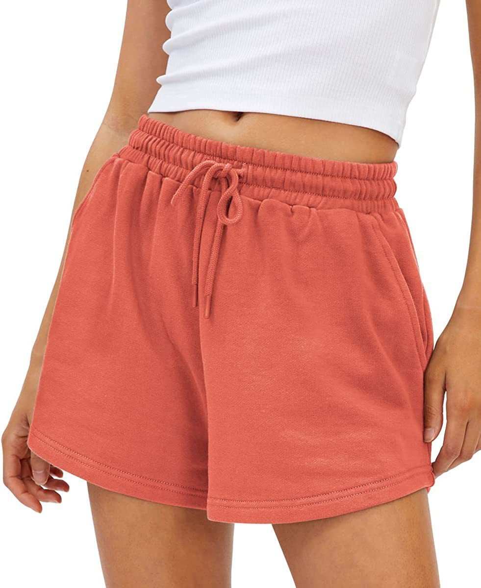 Loose fit shorts in orange with an elastic drawstring waist and comfortable fabric.