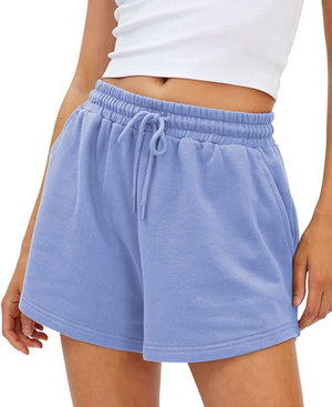 Loose fit shorts in light blue with an adjustable drawstring waist, made from quick-drying, breathable fabric.