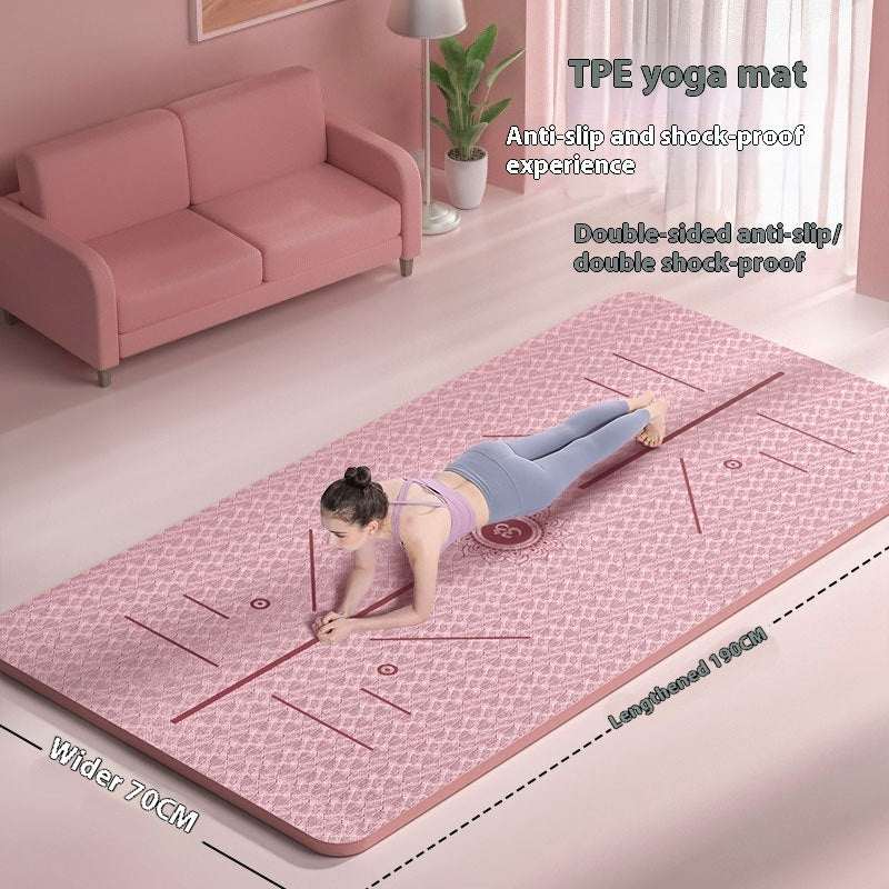 Premium Yoga Mat with non-slip, shock-absorbing surface; features alignment guide for enhanced practice.