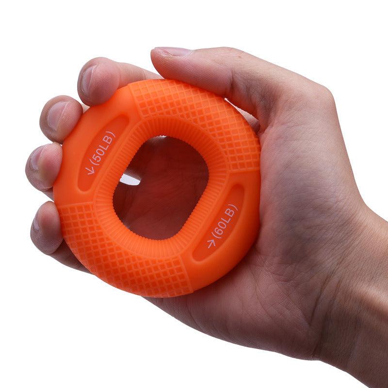 Orange Silicone Grip Ring for hand strength training, customizable resistance.