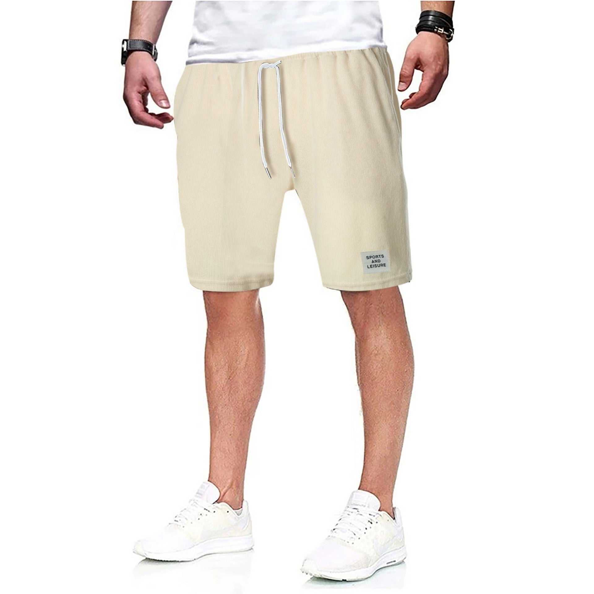 Beige Simple Shorts with drawstring waistband and side pocket, worn by a man.