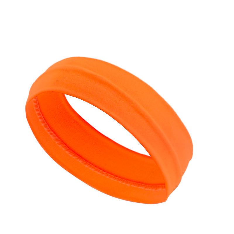 Orange sports headband made from premium cotton, sweat-wicking, one-size-fits-all.