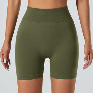 Olive green snug fit yoga shorts with high waistband for comfort and style.