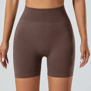 Snug Fit Yoga Shorts in brown, offering breathable, quick-drying fabric and a comfort-enhancing snug fit.