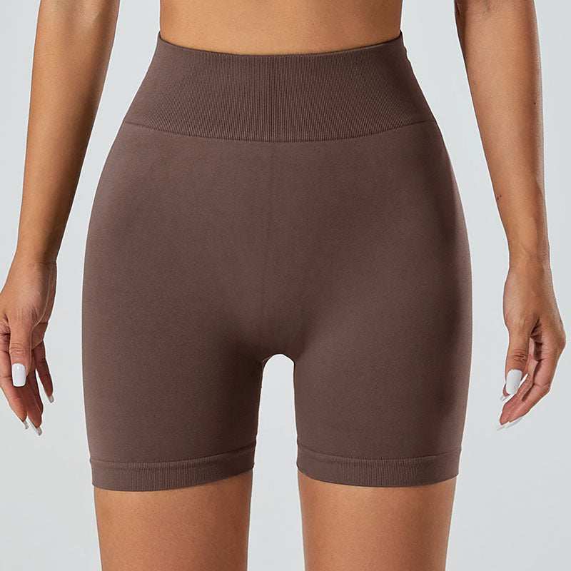 Snug Fit Yoga Shorts in brown, offering breathable, quick-drying fabric and a comfort-enhancing snug fit.