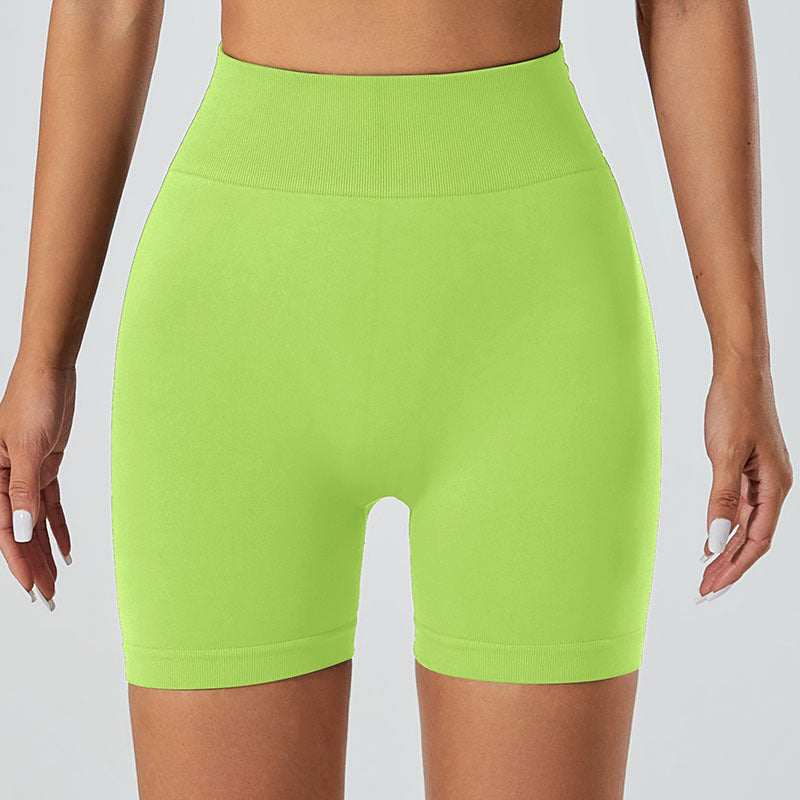 Neon green snug fit yoga shorts, breathable and quick-drying fabric, versatile for workouts.