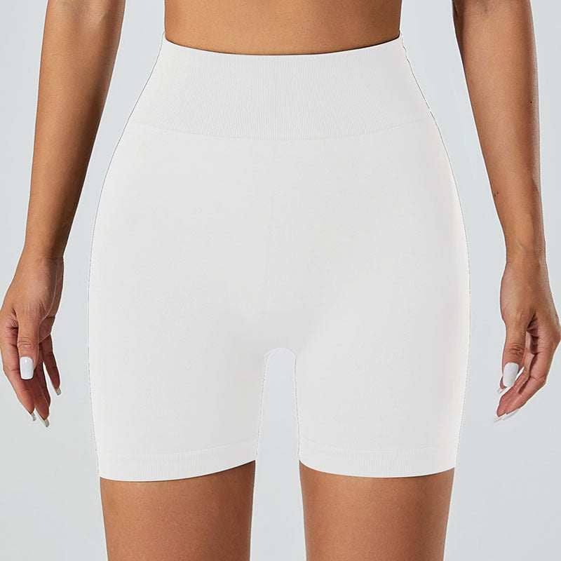 Snug Fit Yoga Shorts in white, showcasing breathable, quick-drying fabric, and snug fit design.