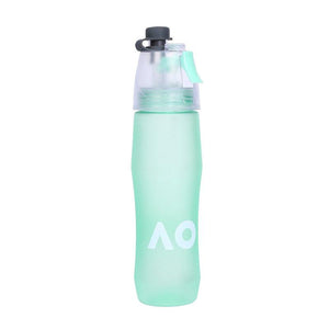 Spray Sports Bottle with mist sprayer and ergonomic grip in teal, perfect for hydration and cooling during outdoor activities.