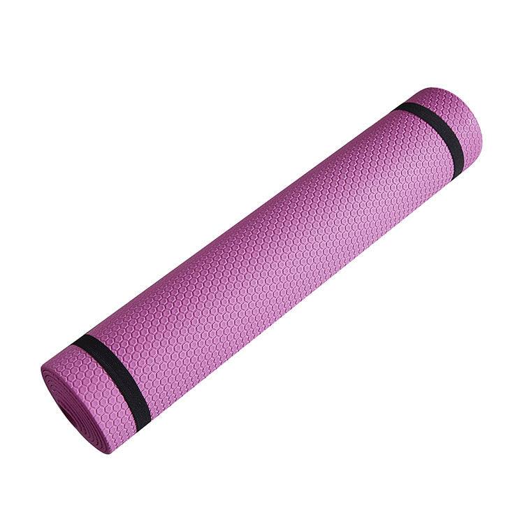 Purple standard yoga mat with non-slip honeycomb design perfect for yoga, pilates, and indoor workouts.