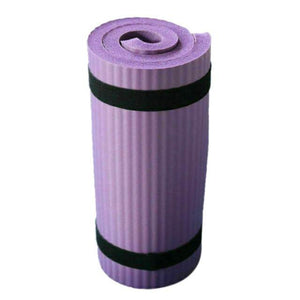 Purple Thick Support Mat with non-slip surface, rolled up for easy storage.