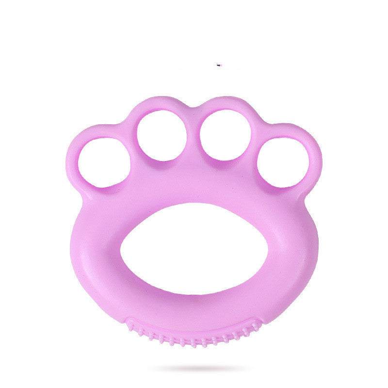 Pink grip ring for hand strength training.