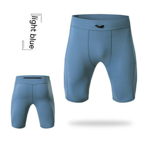 Light blue yoga shorts with quick-drying fabric and pockets.